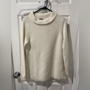 Talbots women’s cream sweater, size S, some pulling on arms, good condition.